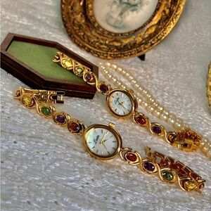 Luxurious Gold Women's Watch with Multicolor Accents